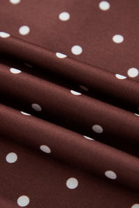 Polka dot pullover sweatshirt with metal-button collar