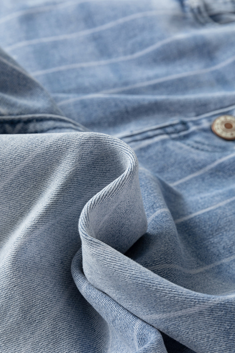 Pinstripe denim wide-leg jeans with multi-button front