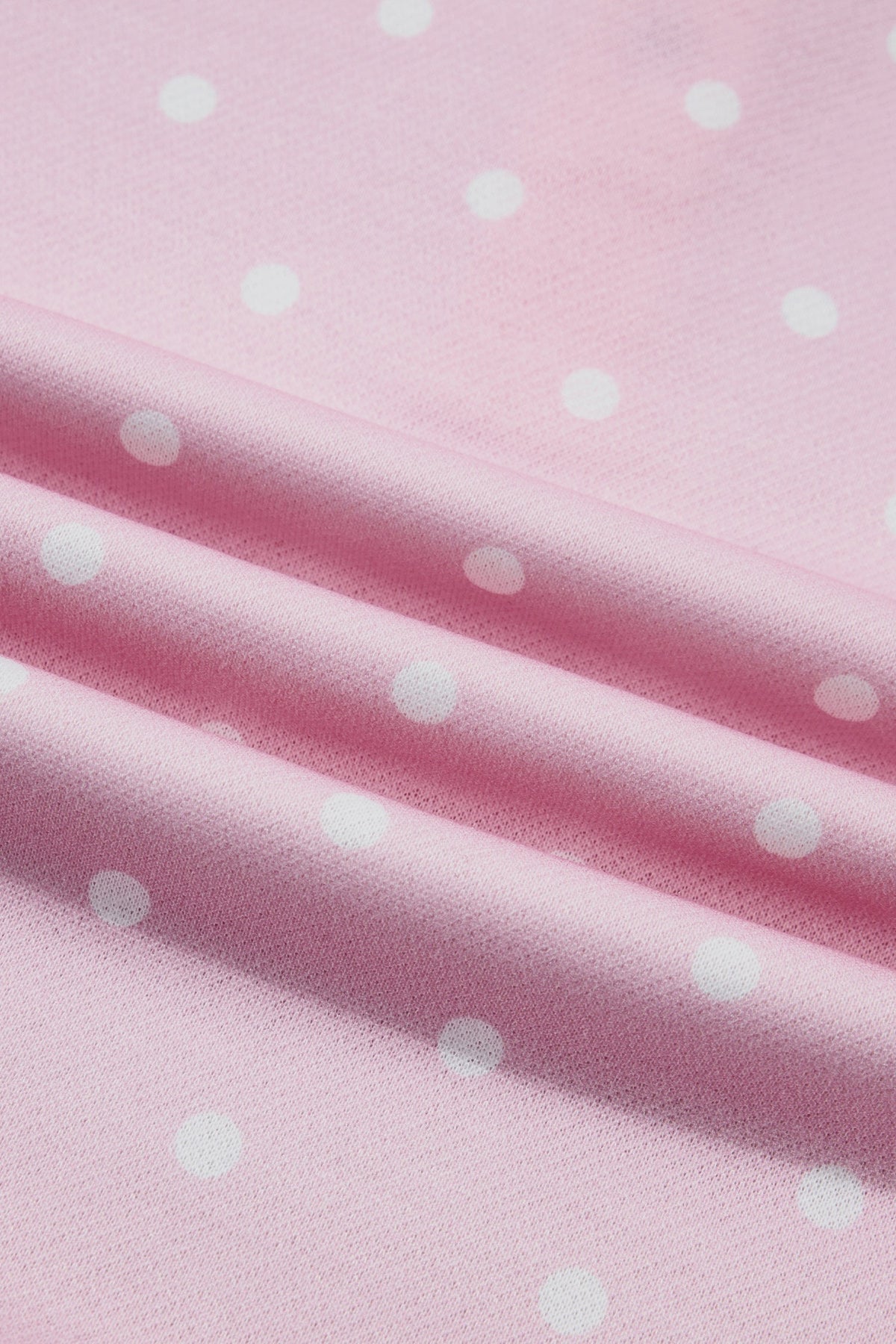 Polka dot pullover sweatshirt with metal-button collar