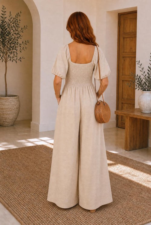 Neutral bubble-sleeve smocked wide-leg jumpsuit with square neckline