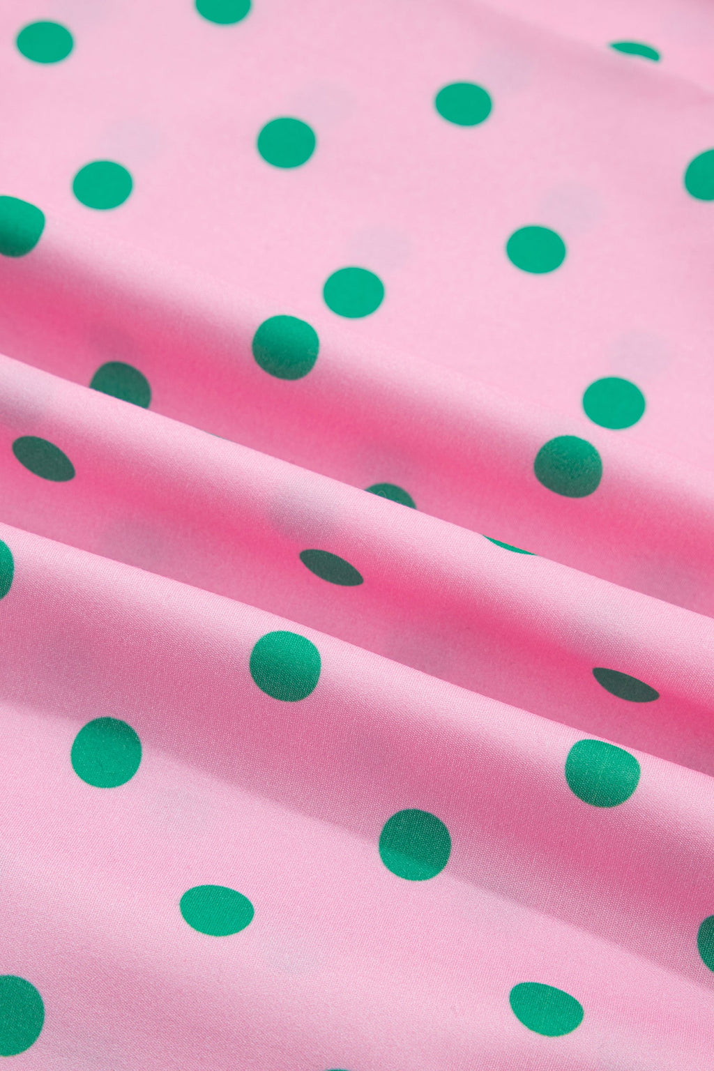 Polka dot V-neck tiered mini dress with puff sleeves