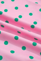 Polka dot V-neck tiered mini dress with puff sleeves