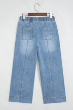 Wide-leg blue jeans with elastic drawstring waist and patch pockets
