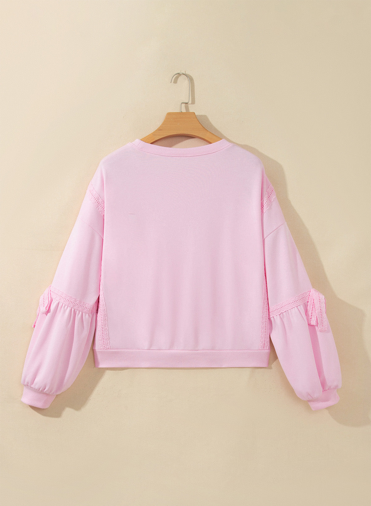 Loose sweatshirt with lace trim and raw-seam detail