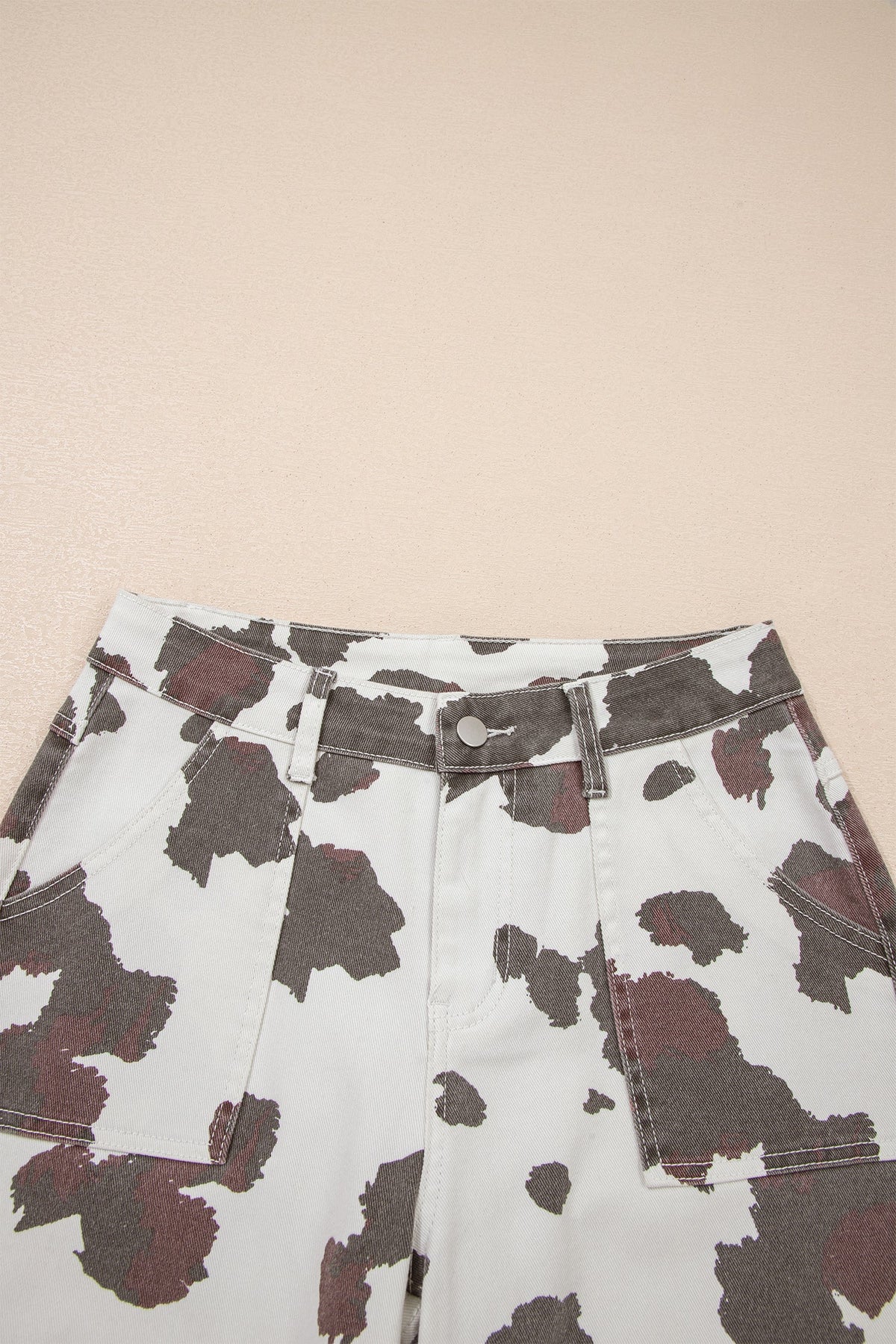 Cow spot western cargo jeans with oversized utility pockets