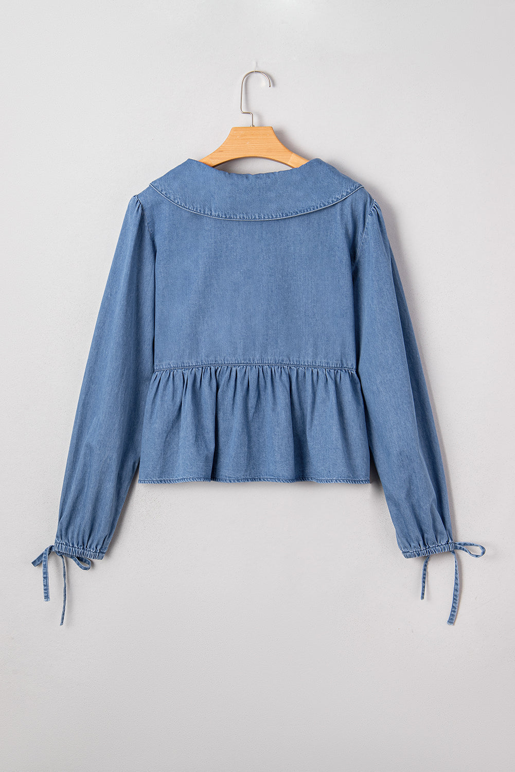 Denim peplum top with balloon sleeves