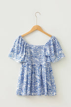 Floral smocked babydoll blouse with square neckline