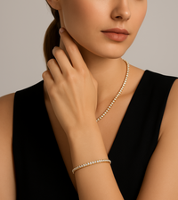 Model wearing a classic 4mm gold tennis bracelet