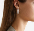 Elegant Sterling Ripple Earrings - Fluid Shine in Every Step