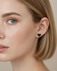 High-polish black mini heart stud earrings