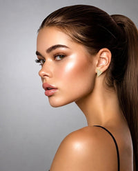 Geometric gold Supera earrings with pavé accents