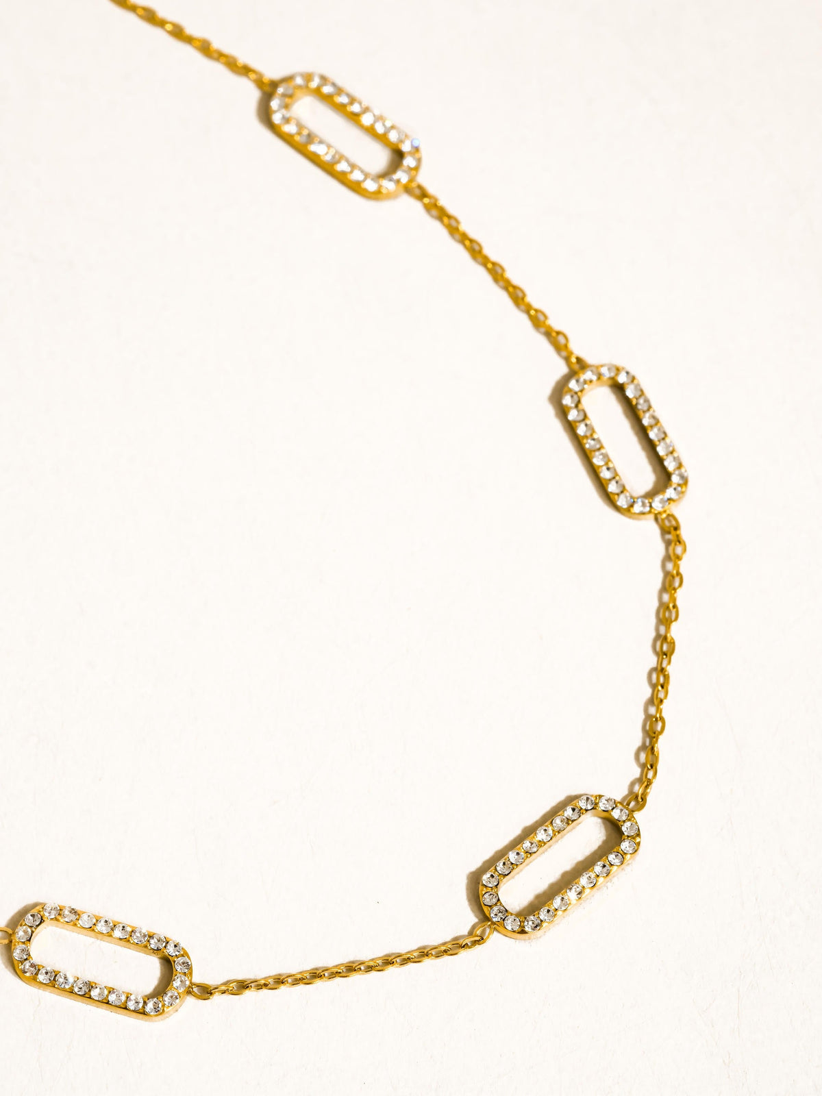 Nave Necklace with polished paperclip links and crystal pavé accents