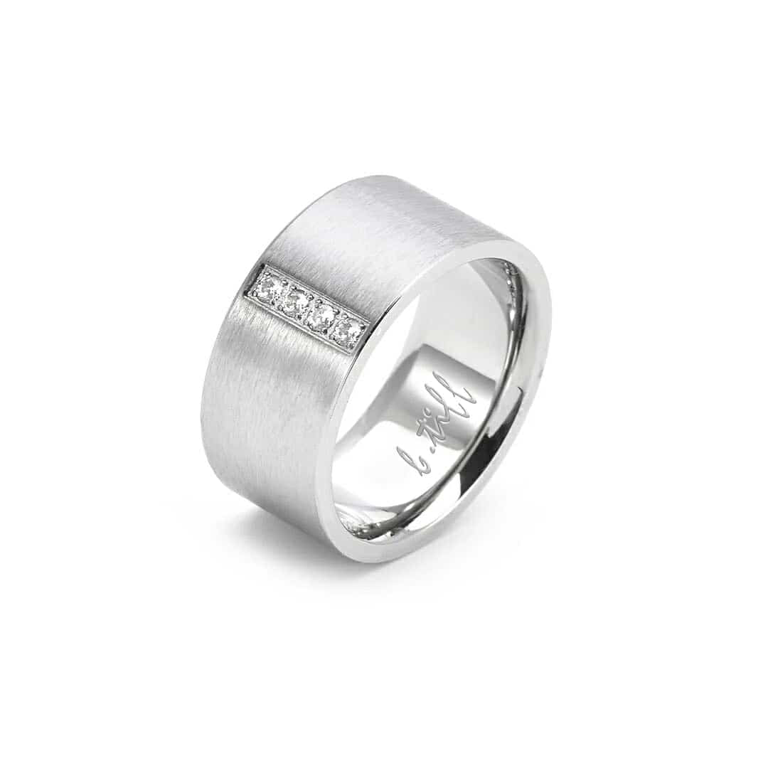 Four-stone wide-band ring