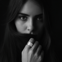 Four-stone wide-band ring