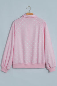 Polka dot pullover sweatshirt with metal-button collar