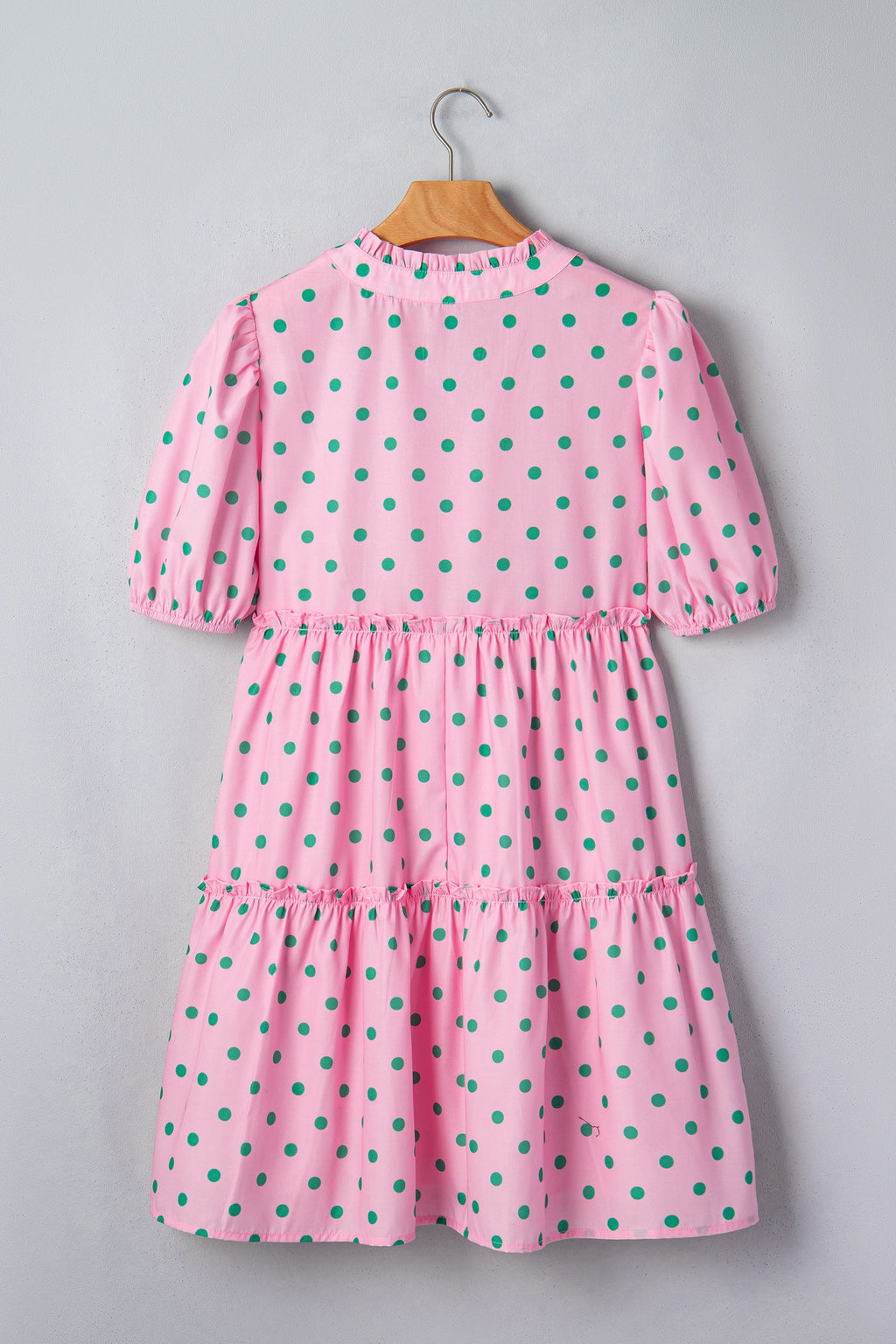 Polka dot V-neck tiered mini dress with puff sleeves