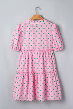 Polka dot V-neck tiered mini dress with puff sleeves