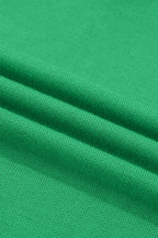 Green button-side sleeveless knit sweater with split hem