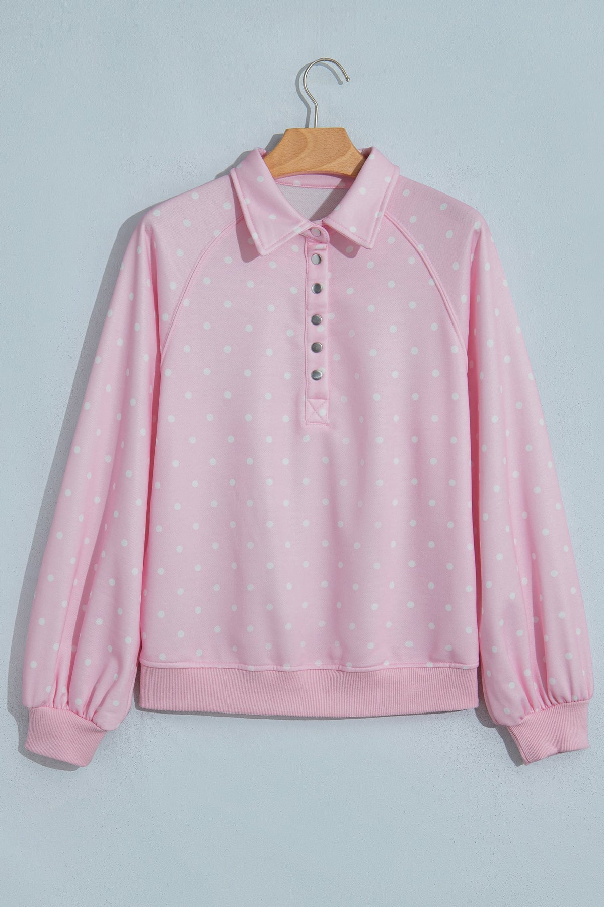 Polka dot pullover sweatshirt with metal-button collar