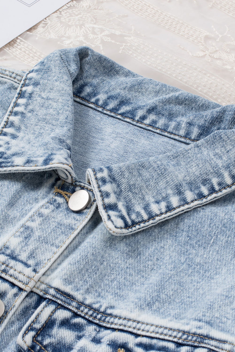 Raw hem distressed denim jacket with button front
